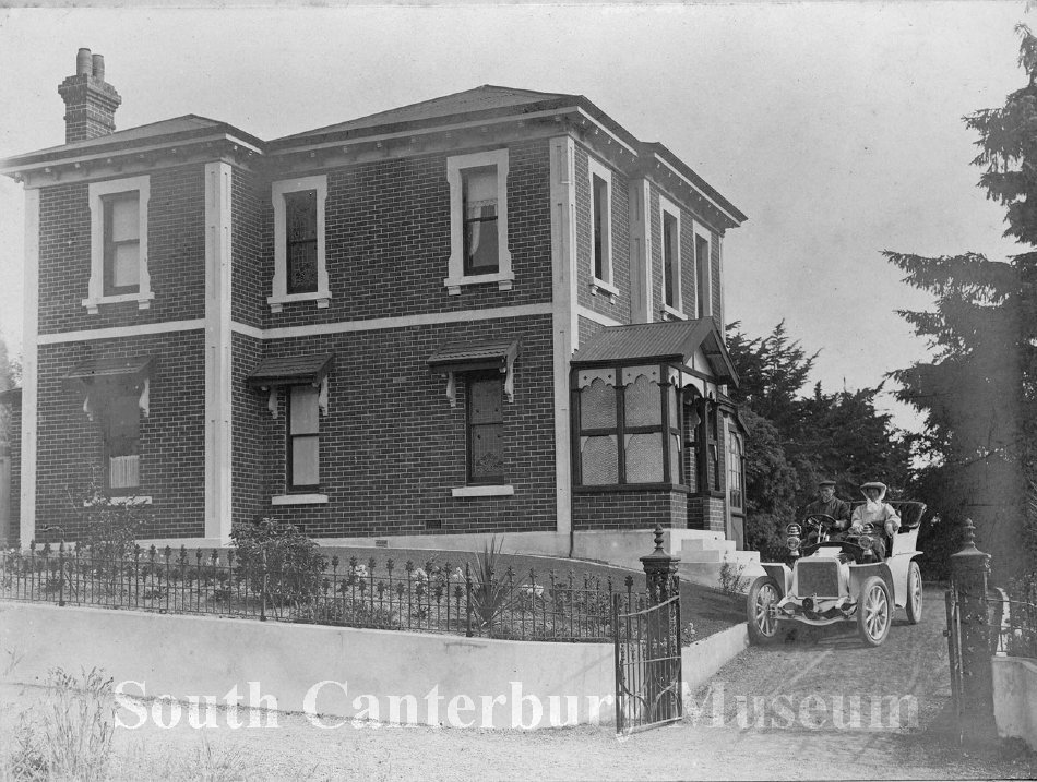 1382 Mr and Mrs Francis Brown posed in their Darraq outside their home south Canterbury Museum Wai iti Rd
