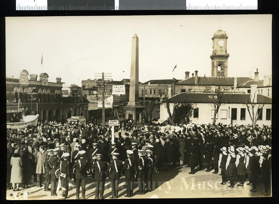 14/05/1932 Memorial service, 50th anniversary of the Benvenue wreck, 1932. Crowds assembled around the Benvenue Memorial, in Sophia Street Timaru, for a service marking the the 50th anniversary of the wreck of the Benvenue, dated 14th May 1932. In the left background the lifeboat Alexandra is visible. South Canterbury Musuem 1456