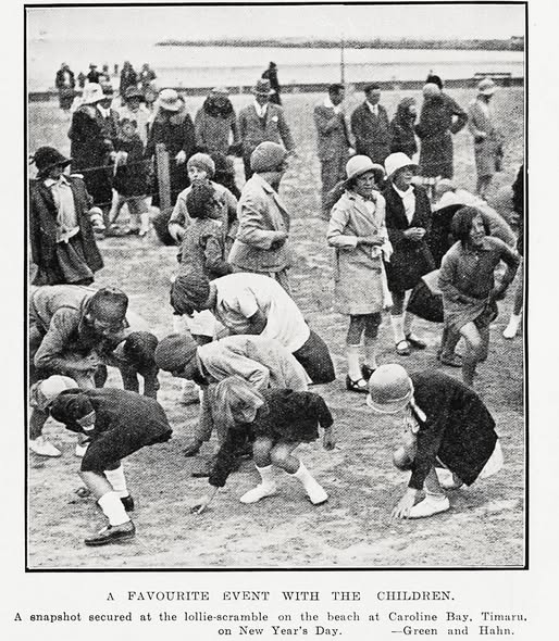 Children taking part at the lolly scramble at Caroline Bay 1932