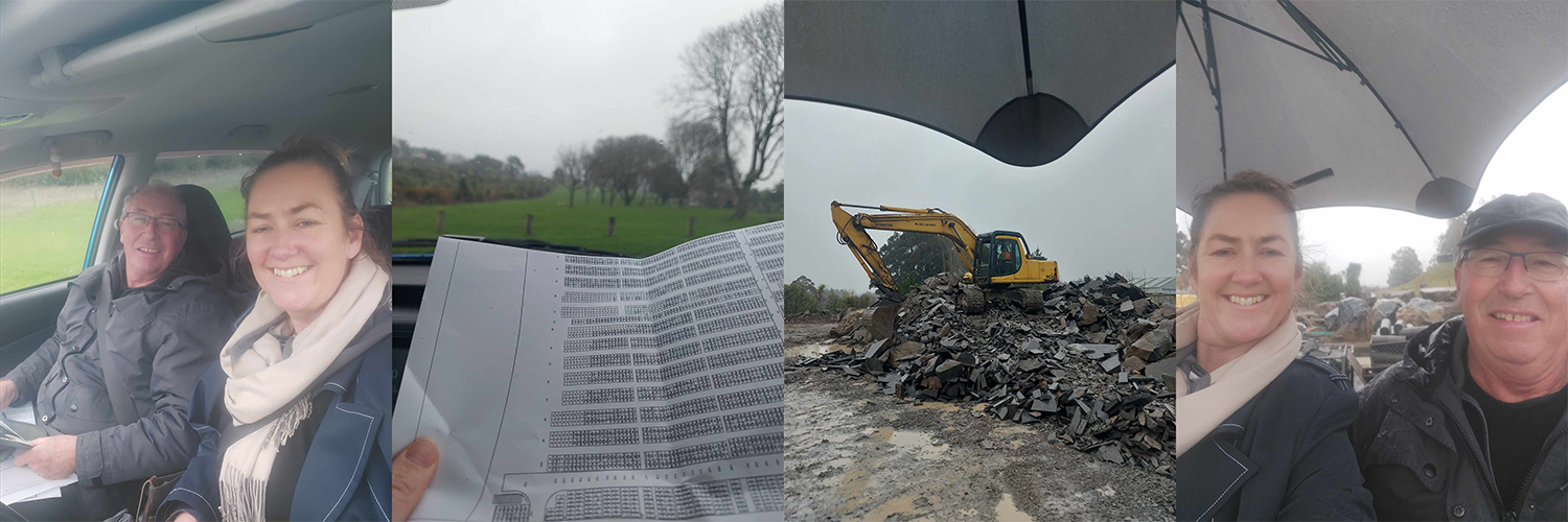Les Jones and Roselyn Fauth shelter from the rain while working out the best location for a monument
