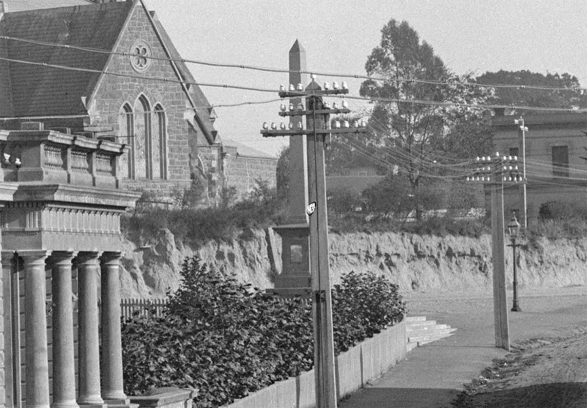 Section of a photo of Post Office Timaru circa 1904 by Muir Moodie Te Papa 014403 shows Benvenue Memorial and St Marys